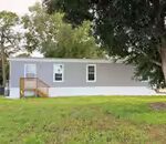 A gray mobile home